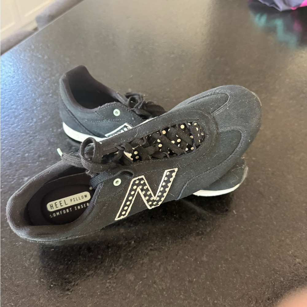 New Balance 742 canvas sneakers.